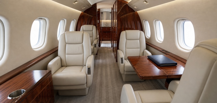 Freshly detailed cream leather interior of a private aircraft